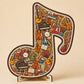 Puinen nuottipuzzle