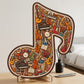 Puinen nuottipuzzle
